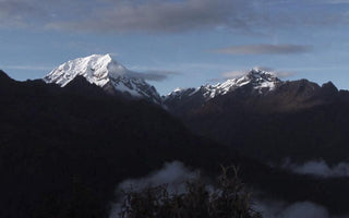 view over snow capped mountains from inca trail campsite